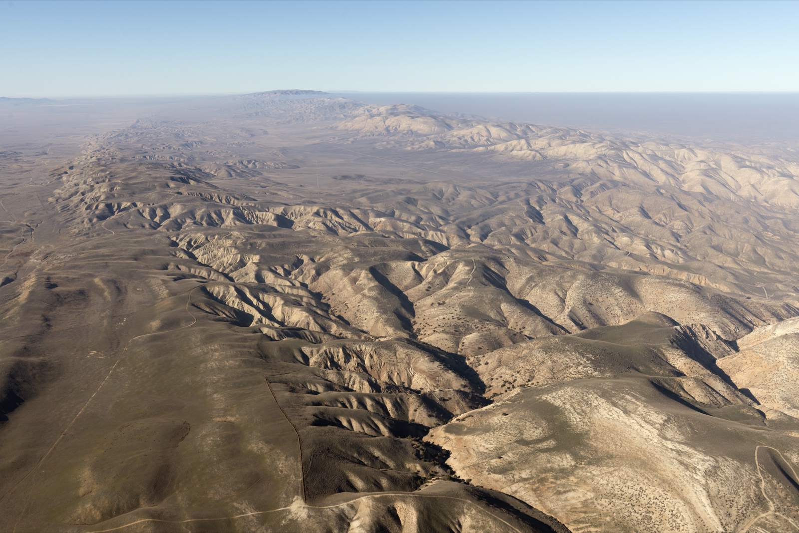 Title: Aerial view of a portion of the San Andreas fault in California's Sierra Madre Mountains, midway between Bakersfield and Santa Barbara
Physical description: 1 photograph : digital, tiff file, color.

Notes: Title, date, and keywords provided by the photographer.; The geological fault runs roughly 810 miles through California. It forms the tectonic boundary between the Pacific Plate and the North American Plate.; Credit line: The Jon B. Lovelace Collection of California Photographs in Carol M. Highsmith's America Project, Library of Congress, Prints and Photographs Division.; Forms part of: Jon B. Lovelace Collection of California Photographs in Carol M. Highsmith's America Project in the Carol M. Highsmith Archive.; Gift; The Capital Group Companies Charitable Foundation in memory of Jon B. Lovelace; 2012; (DLC/PP-2012:063).